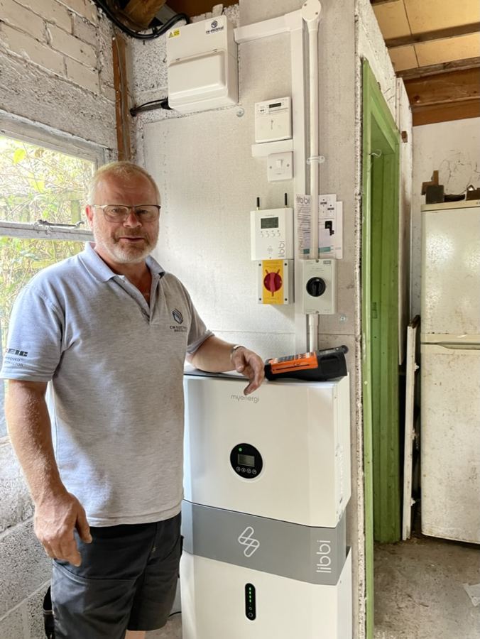 One of the CW Electrical team fitting a home battery